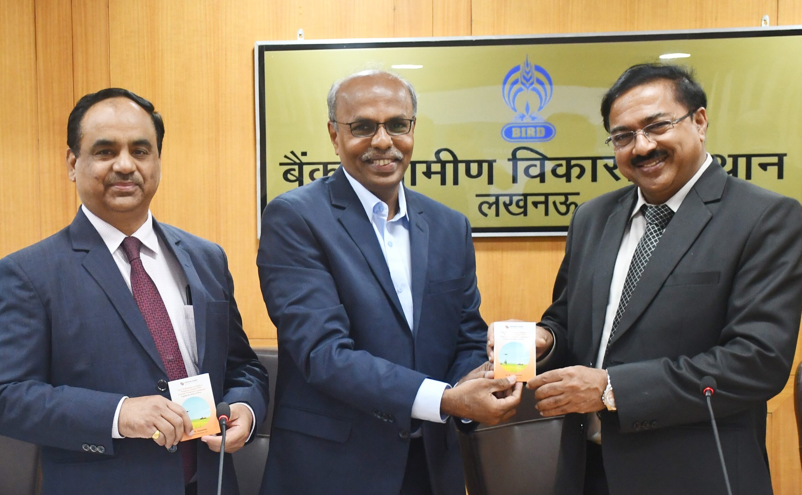 <p>Dr.G.R.Chinthala, Chairman, NABARD is seen releasing the Booklet brought out by Dr.Jey for CEOs of Farmers Producers Companies. Dr.N.Jeyaseelan, CEO, Virutcham Academy and the Director, BIRD look on.</p>
